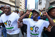 ANCYL chanting outside Luthuli House ready to defend the party's headquarters against the DA's electricity crisis march.