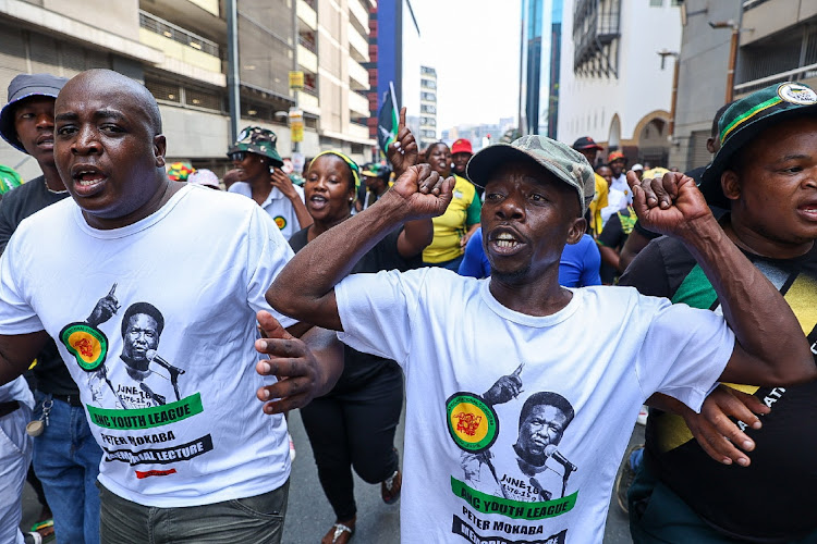 ANCYL chanting outside Luthuli House ready to defend the party's headquarters against the DA's electricity crisis march.