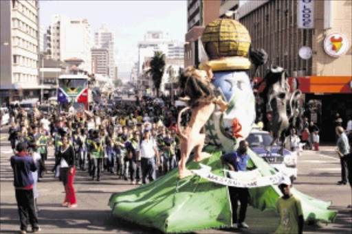 FANFARE: Durban's Prixley ka Seme Street, formerly West Street, was full of entertainers there to welcome the Germans and Australians for yesterday's game at Moses Mabhida Stadium. Pic: THULI DLAMINI. 13/06/2010. © Sowetan.