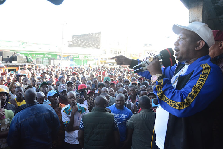 Nairobi Governor Mike Sonko addresses Naivasha residents at the main bus terminus during a visit to the lakeside town on Sunday evening