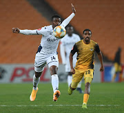 Phathutshedzo Nange of Bidvest Wits challenges Thabiso Mokoena of Black Leopards during the Absa Premiership match between Black Leopards and Bidvest Wits at FNB Stadium on September 02, 2020 in Johannesburg.