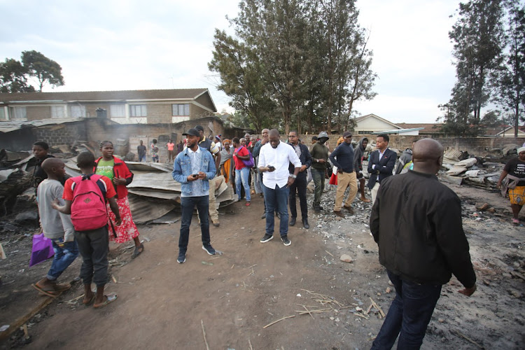 Nairobi Governor Johson Sakaja doing an inspection of the fire incident at Toi Market in Kibera.