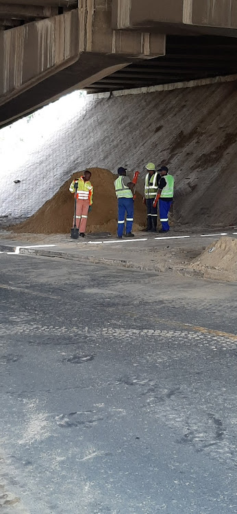 Sand being cleared away from the road at the Booysens offramp December 26 2019.