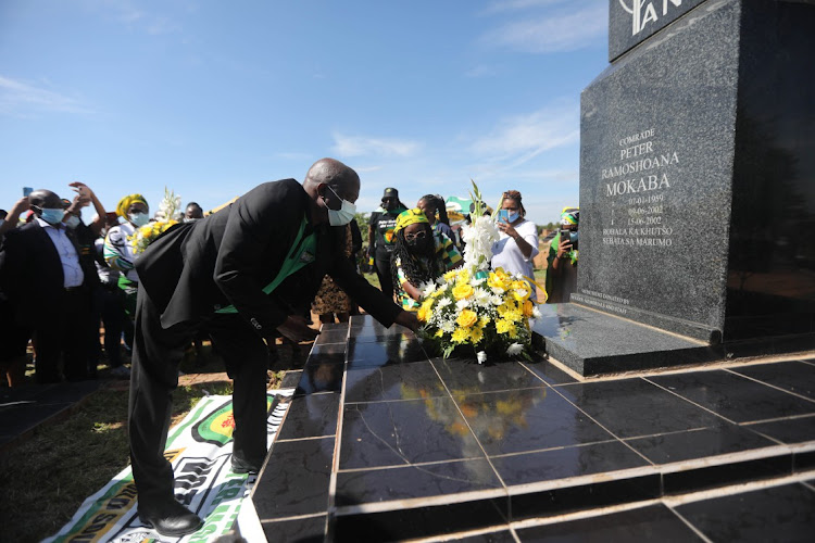 Deputy President David Mabuza lays a wreath on the tombstone of struggle stalwart Peter Mokaba at Mankweng cemetery, near Polokwane, Limpopo.