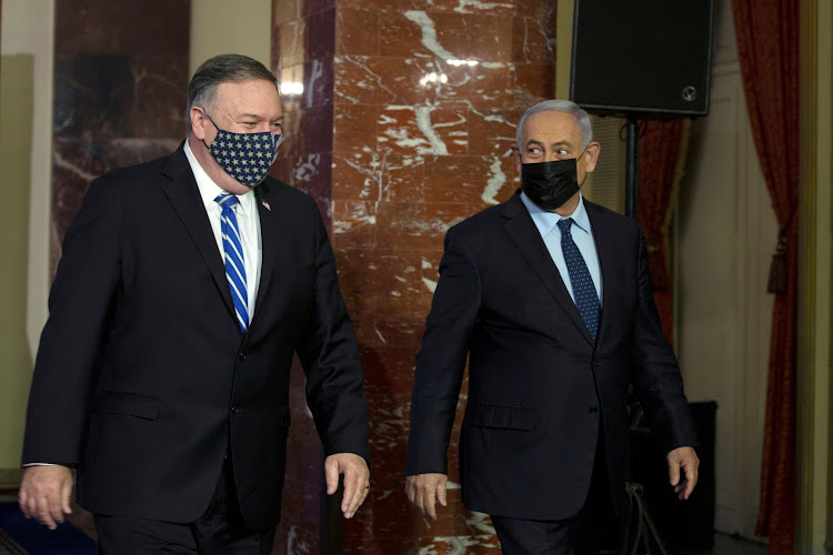 U.S. Secretary of State Mike Pompeo, left, and Israeli Prime Minister Benjamin Netanyahu leave after making a joint statement in Jerusalem, November 19, 2020