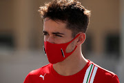 Charles Leclerc of Monaco and Ferrari walks in the paddock before practice at the F1 Grand Prix of Abu Dhabi at Yas Marina Circuit on December 11 2020.