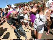 Papa Smurf and other revellers shake their booties at  Rocking the Daisies in Darling.