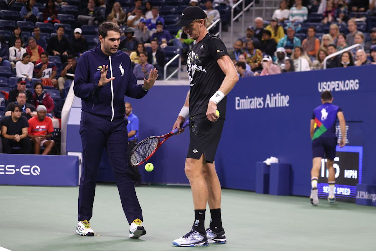 SA's Kevin Anderson discusses a wet spot on the court with an umpire during his match against Diego Schwartzman of Argentina at the US Open on Wednesday in the Flushing neighbourhood of the Queens borough of New York City.