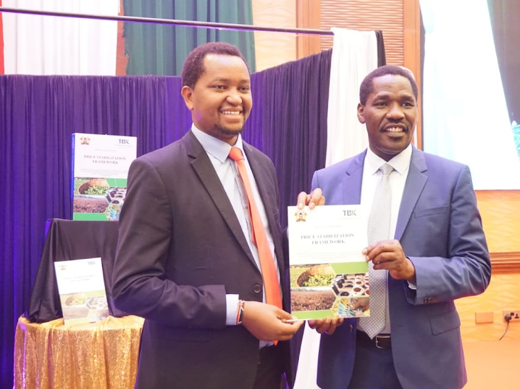 Agriculture CS Peter Munya and Price Stabilization Committee chairman Irungu Nyakera during the launch of the tea industry price stabilization framework report in Nairobi.