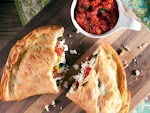 Three Cheese Caprese Calzone was pinched from <a href="https://www.foodnetwork.com/recipes/three-cheese-caprese-calzone-1961595" target="_blank" rel="noopener">www.foodnetwork.com.</a>