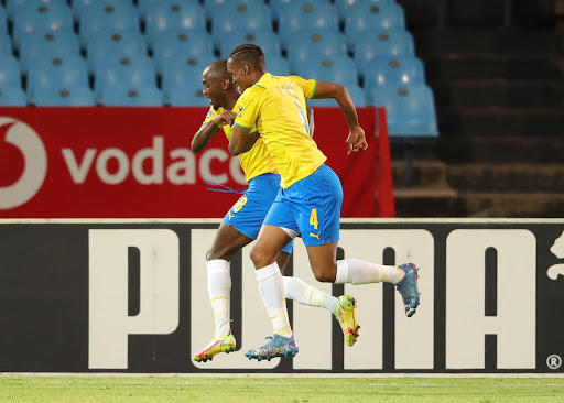 Peter Shalulile celebrares with his Mamelodi Sundowns teammate Grant Kekana after scoring the third goal.