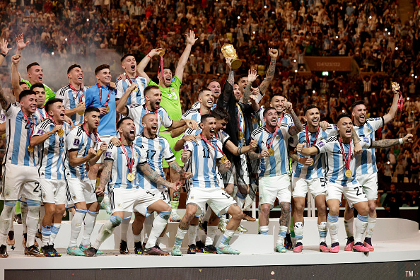 Lionel Messi of Argentina and teammates celebrate after winning the Fifa World Cup Qatar when they beat France on penalties at Lusail Stadium.