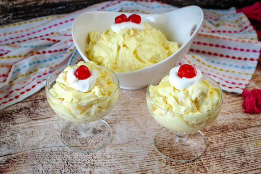 Pineapple Pudding Salad in two serving glasses.