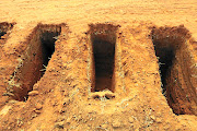 Empty graves await bodies to be buried without the knowledge  of their loved ones.