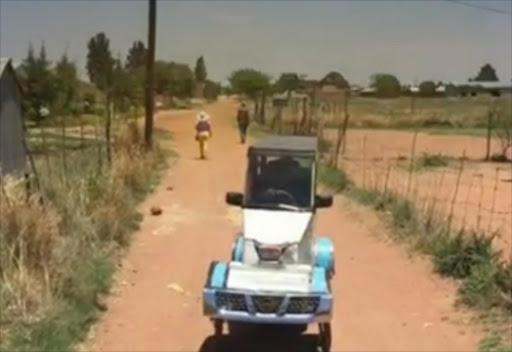 Unemployed carpenter Simon Skhosana has built his own pedal car from scrap scrap material and bicycles.