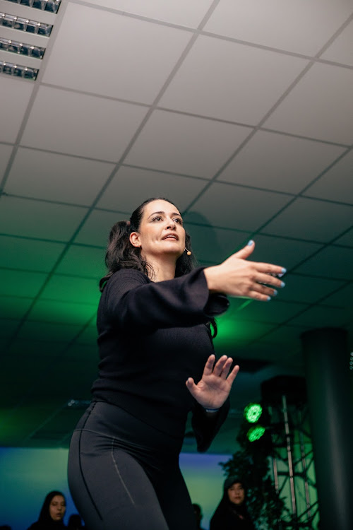 Well Collective coach Zahra Said leading attendees through a Tai-Chi session during the Nike Well Festival in Newtown.