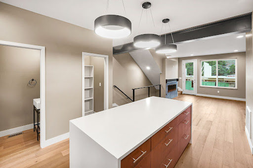 modern kitchen island, staircase, bright living room - Buy this luxury property in Durango, 2 bedrooms