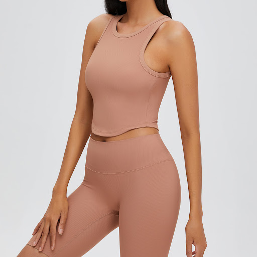 Title 9, Sports Short Yoga Suit with Chest Pad. Provides...