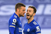 Leicester City's Jamie Vardy celebrates scoring their second goal with James Maddison.