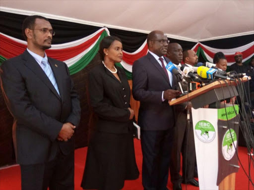 IEBC chairman Wafula Chebukati and other commissioners address the press at Bomas of Kenya on Wednesday, October 25, 2017. /PATRICK VIDIJA