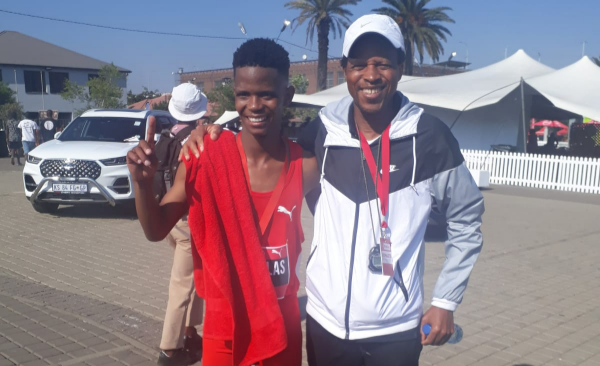 Nicholas Seoposengwe and his coach Hendrick Ramaala.