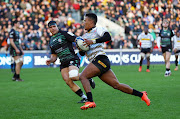 The Stormers' Angelo Davids runs through to score their fourth try in the Heineken Champions Cup match against London Irish at Brentford Community Stadium in London on January 15 2023.
