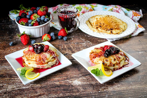 cheesecake pancakes with berry lemon syrup