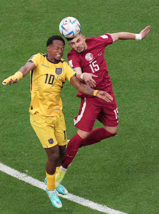 Qatar's Bassam Alrawi (L) in action with Romario Ibarra of Ecuador during a 2022 Fifa World Cup Group A match at the Al Bayt Stadium in Al Khor, Qatar on November 20