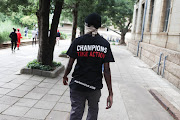 Protesting students make their way to the main campus of the University of the Witwatersrand in Johannesburg on March 3 2023.