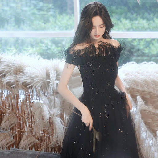 Title 7, Black evening dress for women, offering eleganc...