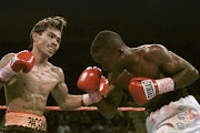 Manny Pacquiao and Lehlohonolo Ledwaba exchange blows during their IBF Super Bantamweight Championship bout at the MGM Grand Hotel & Casino in Las Vegas, Nevada. Pacquiao won the bout by way of knockout after six rounds. 