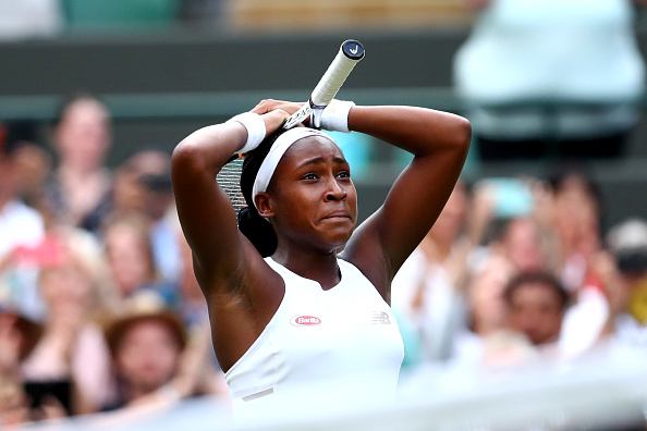 Cori Gauff of the United States celebrates victory after her Ladies' Singles first round match against Venus Williams of The United States during Day one of The Championships - Wimbledon 2019 at All England Lawn Tennis and Croquet Club on July 01, 2019 in London, England.