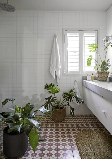 Detailed repeating pattern on floor tiles can help to make a small bathroom seem larger.
