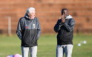 Bafana Bafana coach Hugo Broos and assistant coach Helman Mkhalele during the team's training session at Sturrock Park on June 1 2022. 