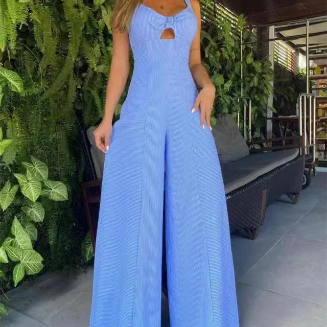 Kadın Kolsuz Düz Renk Çizgili Bol Paça Rahat Tulum. Günlük kullanım için ideal, rahat ve şık bir görünüm sunar.