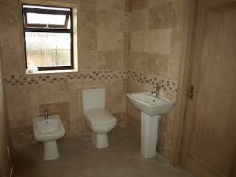 bathroom complete install including tiles, under floor heating and ground source heat pump install- Porthcawl album cover