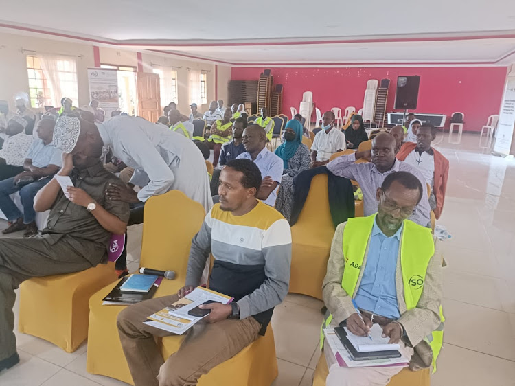 Participants follow the launch of peace and development project in Moyale