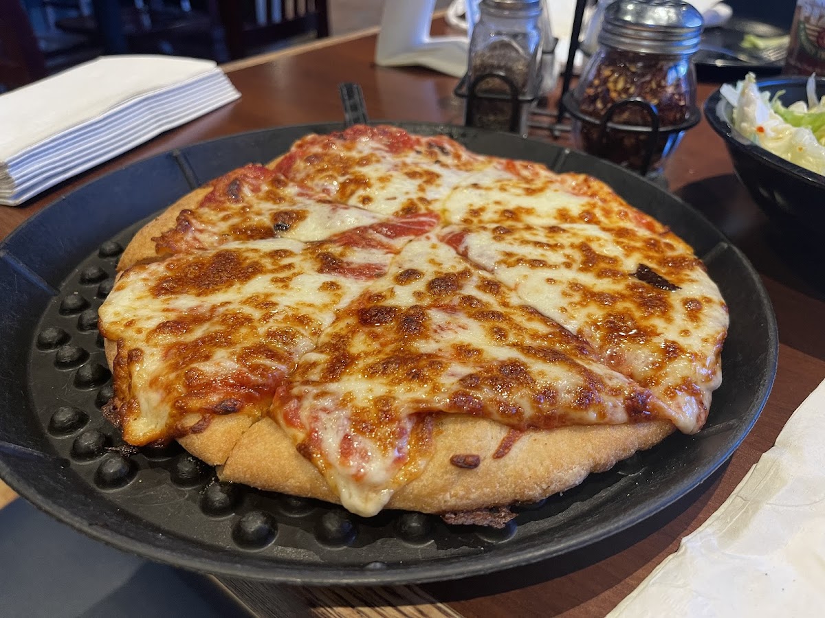 Thick crust GF pizza. Wow! Tomato sauce was a tad sweet.