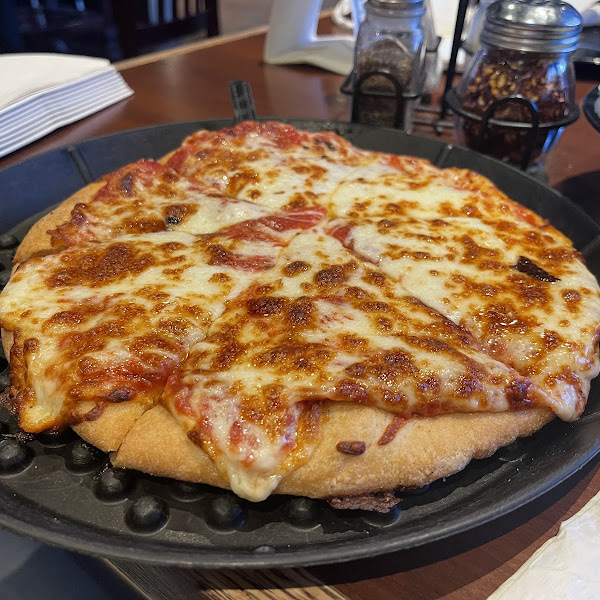 Thick crust GF pizza. Wow! Tomato sauce was a tad sweet.