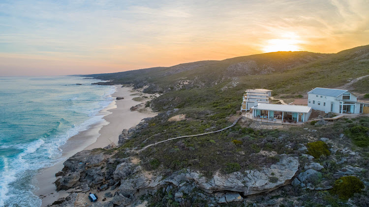 The sun setting over the Lekkerwater Beach Lodge.