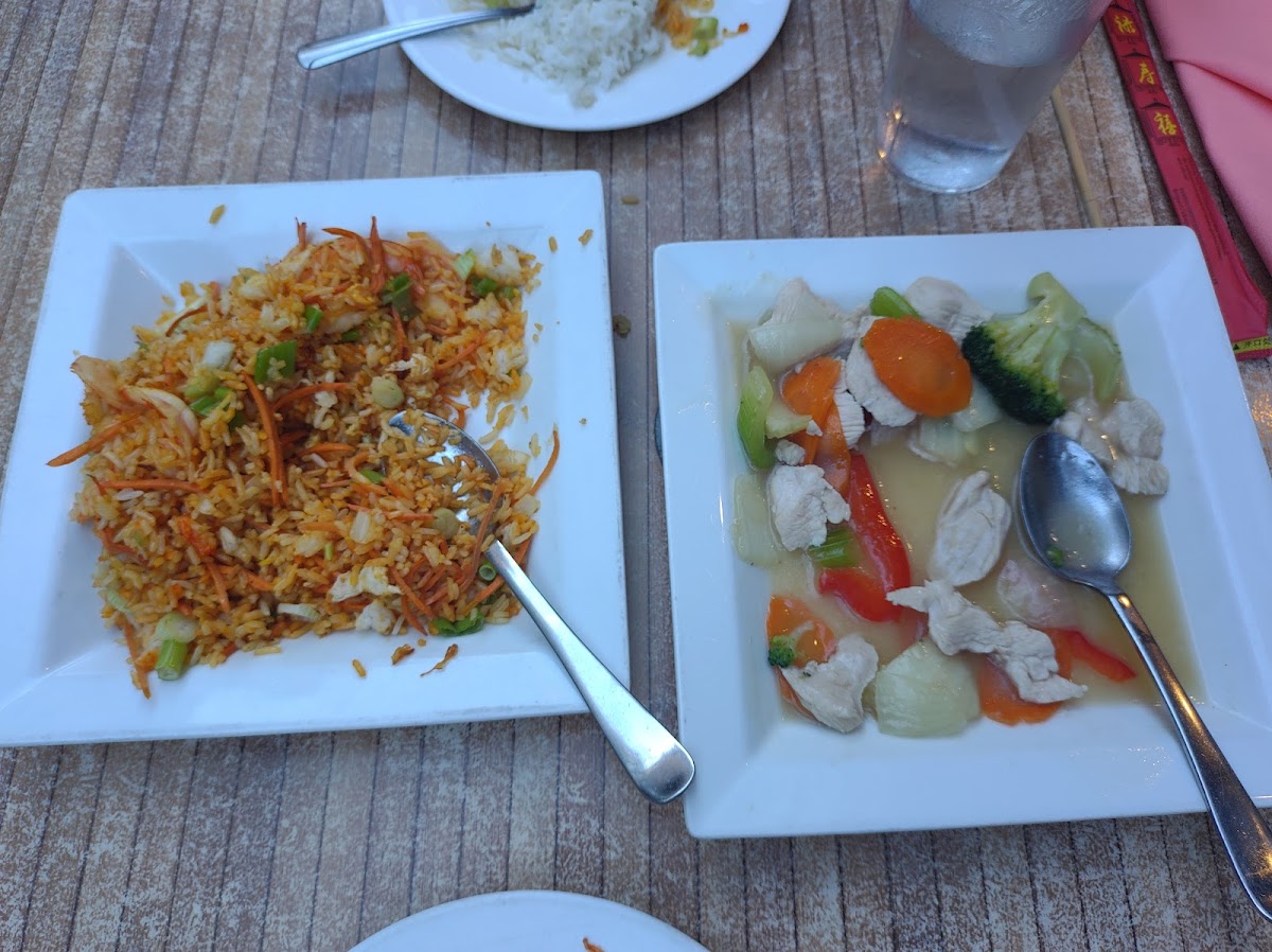 Shrimp fried rice and traditional stir-fry with chicken