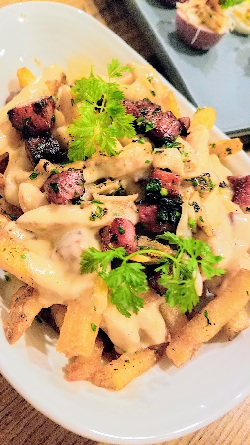 Chowder Fries with razor & manilla clams and bacon at King Tide Fish and Shell, Portland