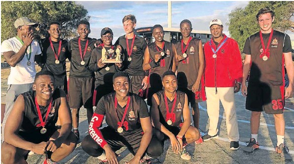 The Kingswood team which won the PE Comets basketball tournament at the weekend are, from left, front, Bandile Kunene, Chiti Mutale, Kuhle Tinga; back, coach Siyabulela Mteto, Aluta Tonjeni, Zolani Booi, Letsema Makobole, Ethan Yates, Sibabalwe Tshoko, Mahube Mpugwa, coach Gervase Makoni, Lucca Rozza