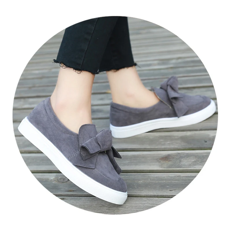 Chaussures en toile avec nœud pour femmes. Confortables et élégantes, parfaites pour un look décontracté. Légères et respirantes, idéales pour toutes occasions.