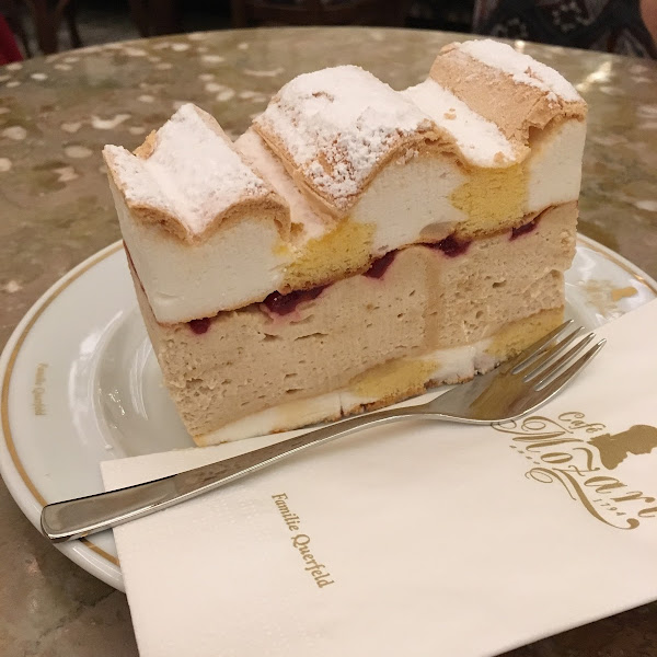 Merengue with yellow cake, coffee mousse filling and a layer of fruit spread. One of the most insane desserts I’ve ever had!