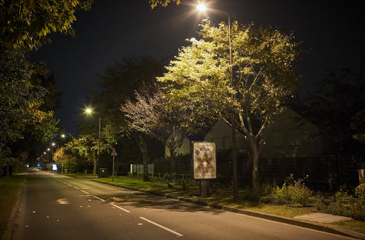 Cotton wool marks the scene where police shot a man after he decapitated a middle school teacher after posting the act on social media on October 16, 2020 in Conflans-Sainte-Honorine, France.