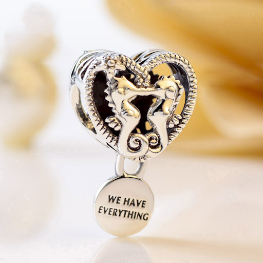 Title 4, Hollow seahorse pattern heart charm