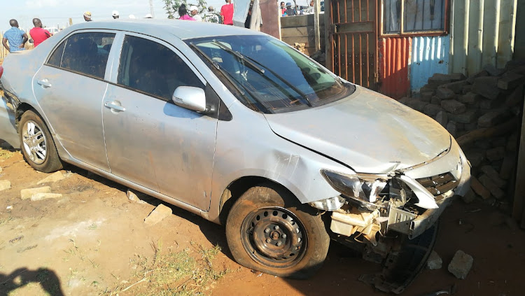 A car crashed through a shack in an informal settlement south of Johannesburg on Sunday morning, killing a sleeping man.