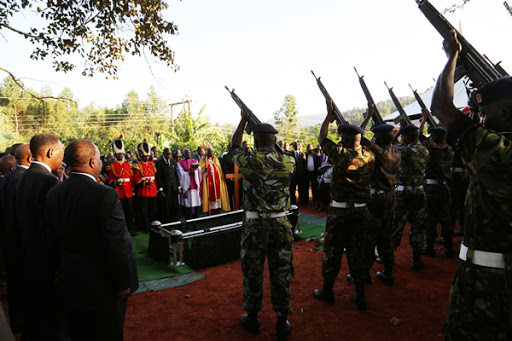 Kenya Defence Forces fire gun salute during the burial of General Rtd Jackson Mulinge