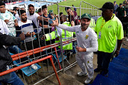 Dean Elgar interacts with the fans after receiving his player of the match trophy on day 3 of South Africa's first Test victory against India at SuperSport Park in Centurion on December 28. 